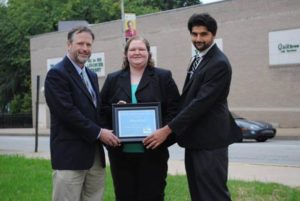 Dana Keith receiving an award from Smart Growth
