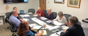 Smart Growth board members meeting around a conference table